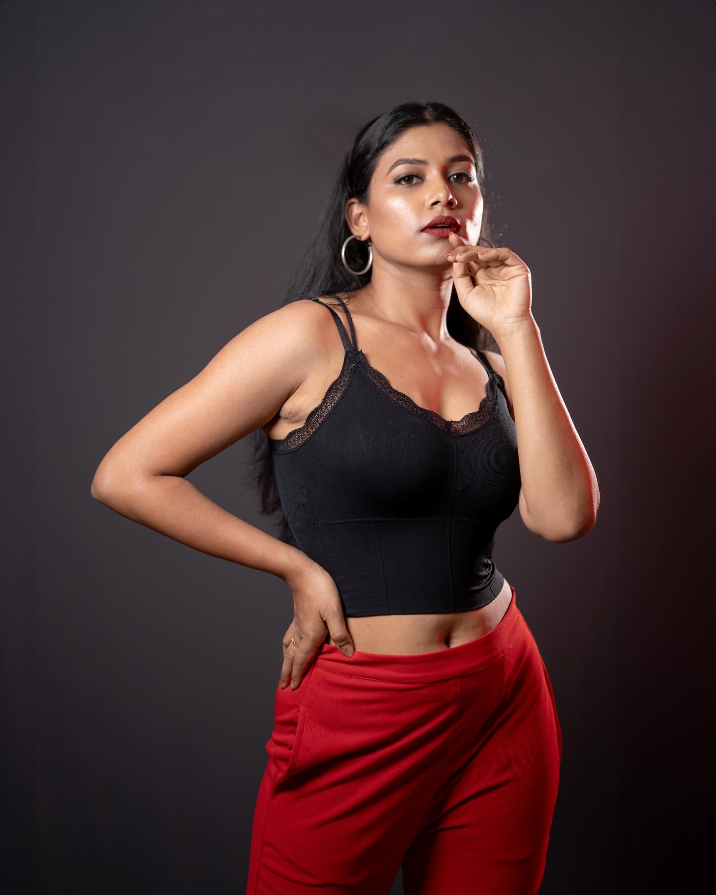 Sai Prasanna — main headshot, red and black